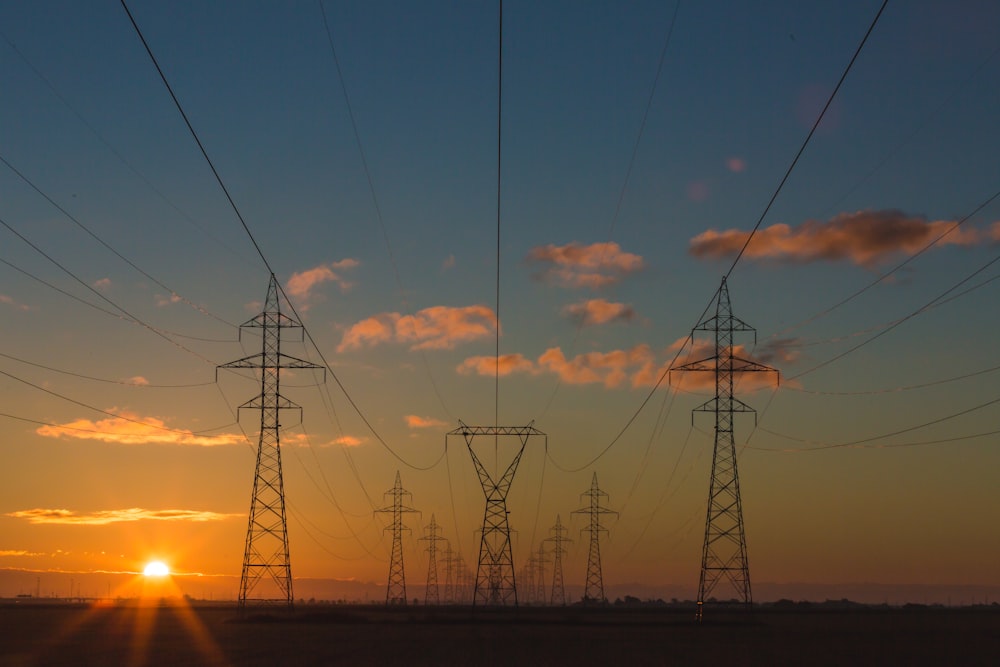 High-voltage transmission lines at dusk